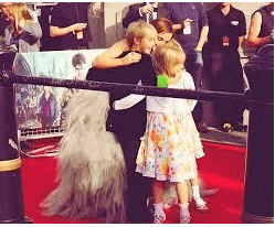 Emma Watson with her siblings on a red carpet